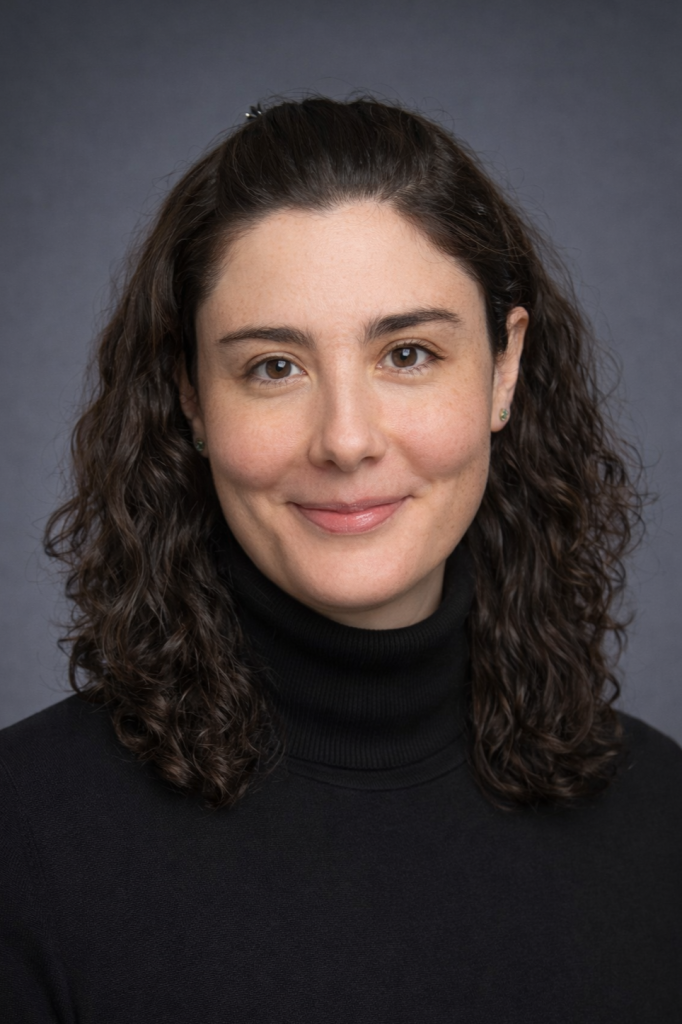Professional headshot of Dr. Dilek Uz, 2026 Utility Policy Fellow and Associate Professor of Economics, smiling and looking toward the camera.