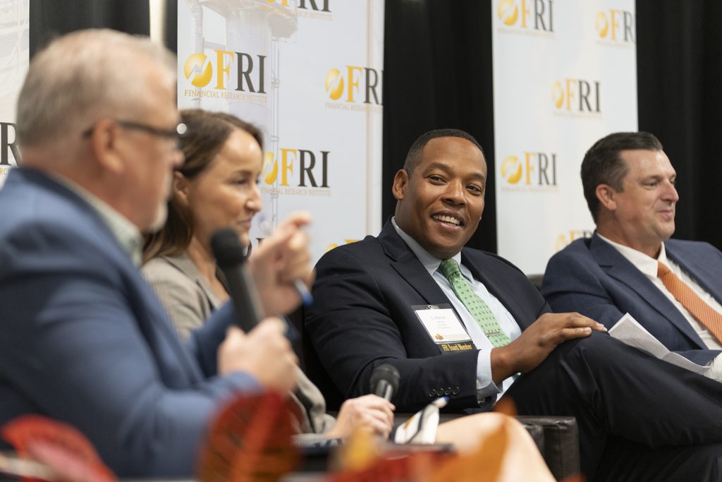 Patrick Woods, President of ITC Great Plains (center), during the “Breaking the Affordability Code” panel discussion