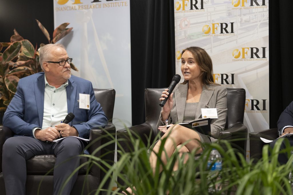 (left to right) David Springe, Executive Director of the National Association of State Utility Consumer Advocates, and Jessica Hobbick, VP of Rates and Regulatory for Arizona Public Service, during the “Breaking the Affordability Code” panel discussion

